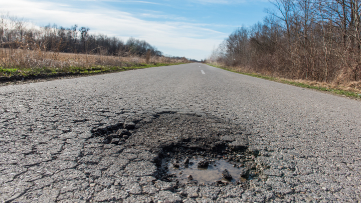 Pothole in road.