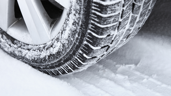 Truck tire in snow.