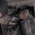 Rear Coil Spring and Shock Absorber Removal Procedure - Step 2