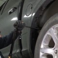 Rear Coil Spring and Shock Absorber Removal Procedure - Step 14