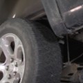 Rear Coil Spring and Shock Absorber Removal Procedure - Step 12