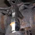 Rear Coil Spring and Shock Absorber Removal Procedure - Step 10
