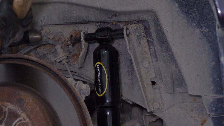 Installing new shock on the vehicle